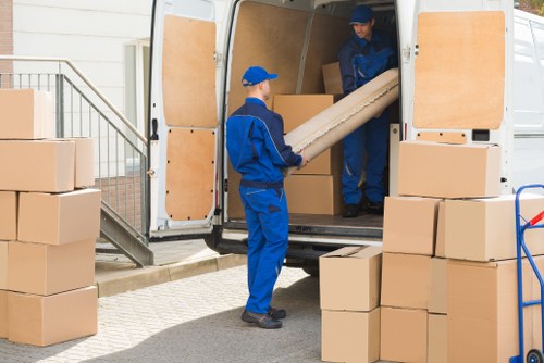 Removal team planning a move in Primrose Hill near residential flats