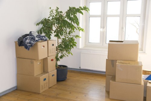 Packed boxes and moving equipment for a Primrose Hill relocation