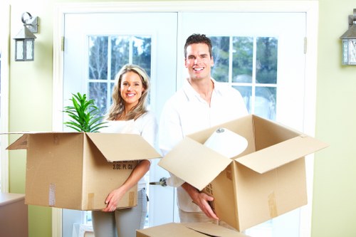 Loading furniture into a removal truck for a Primrose Hill home move