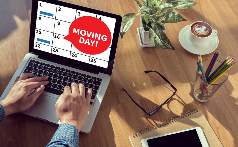 Local office movers handling desks and boxes near Primrose Hill